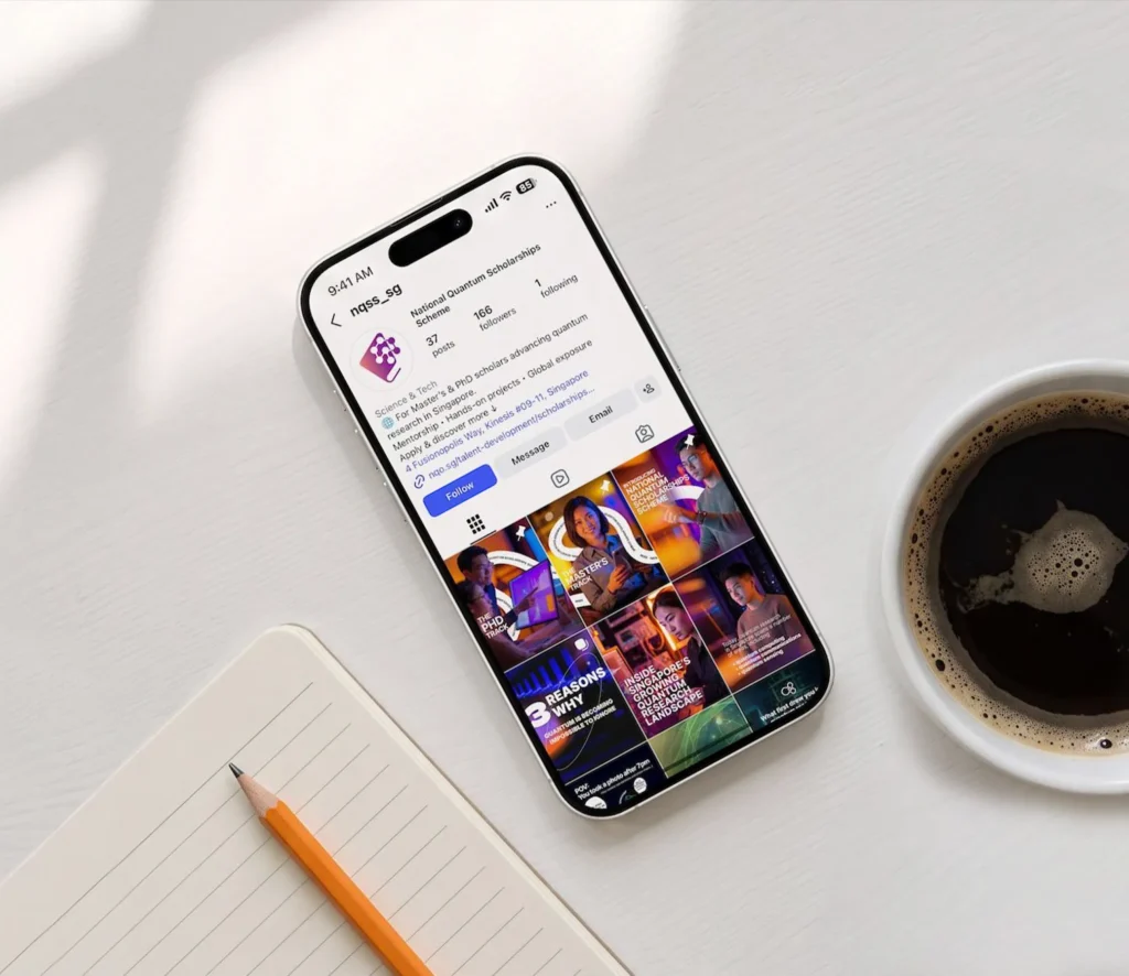 National Quantum Office Social Media Static Posts on phone on a desk